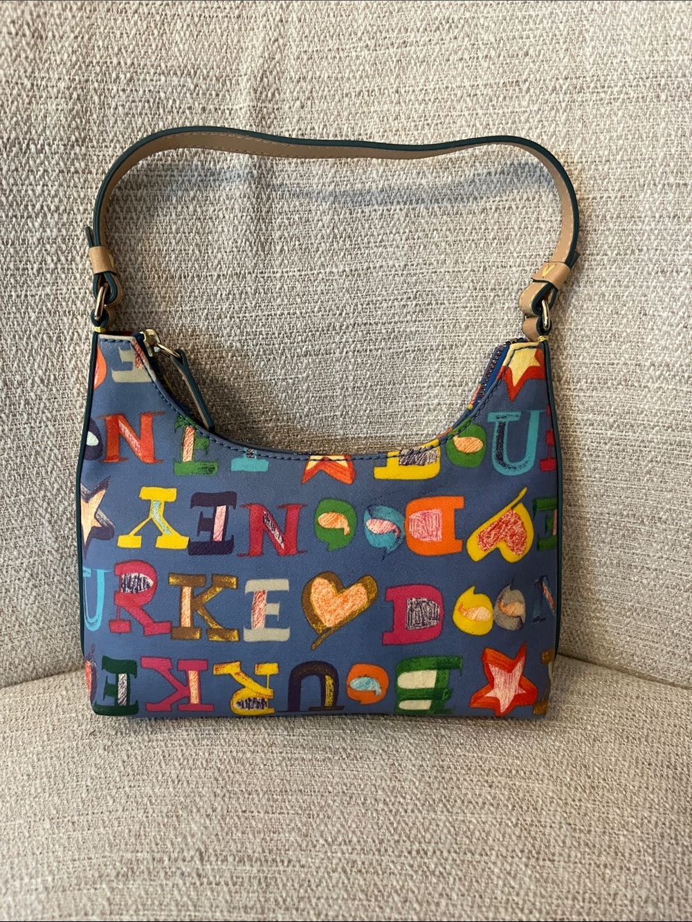 NWOT Dooney and Bourke Blue Mini Short Shoulder Bag, warranty card inc